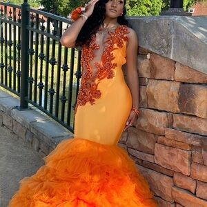 Custom designed Orange Ruffled Jeweled Mermaid Gown perfect for prom or wedding